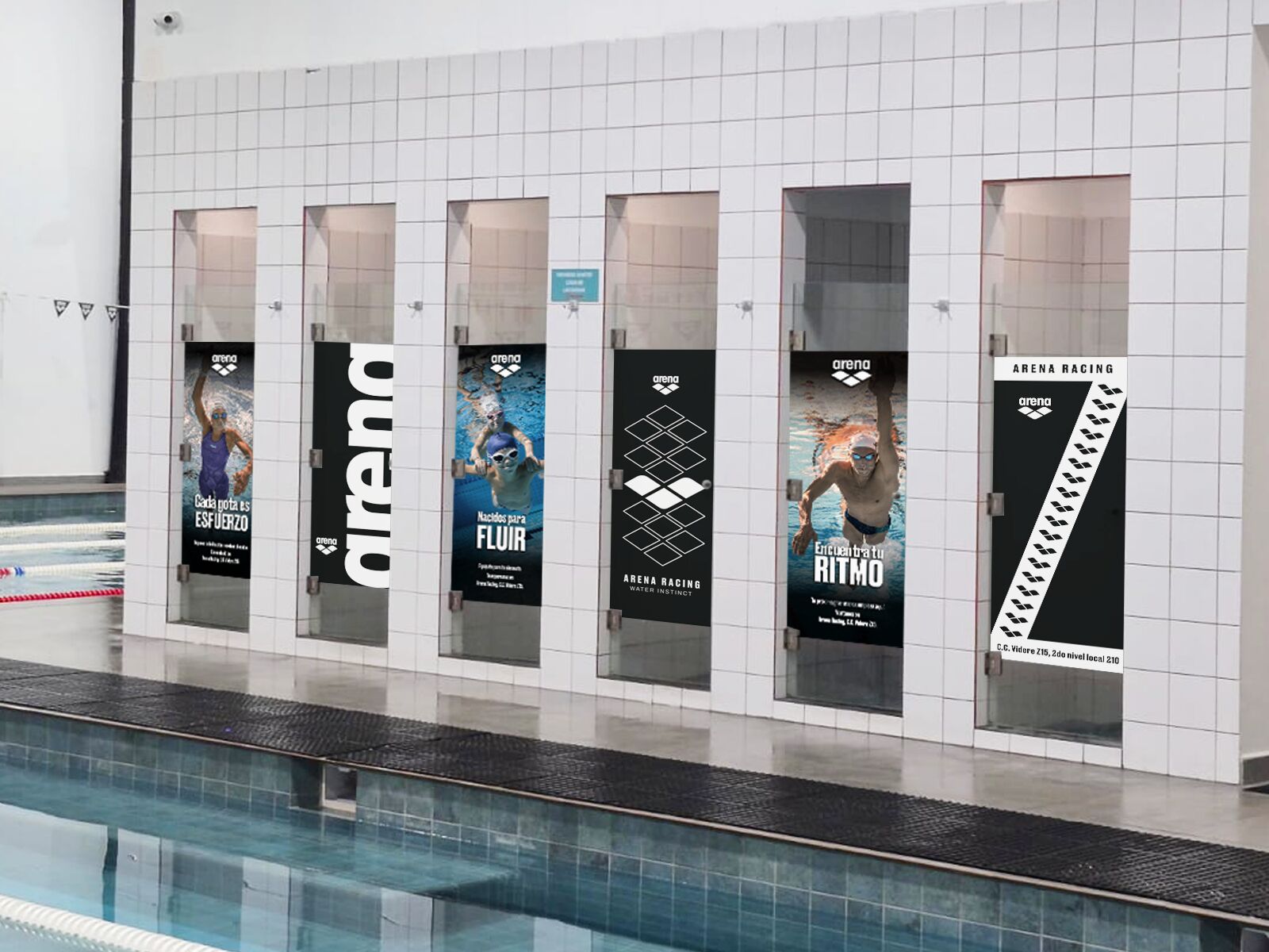 Montaje de afiches Arena en puertas de gimnasio